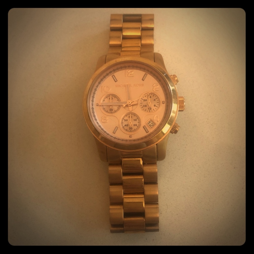 Michael Korda gold watch